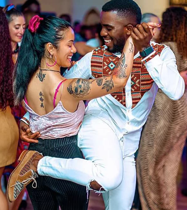 photo of a dancing couple dancing semba